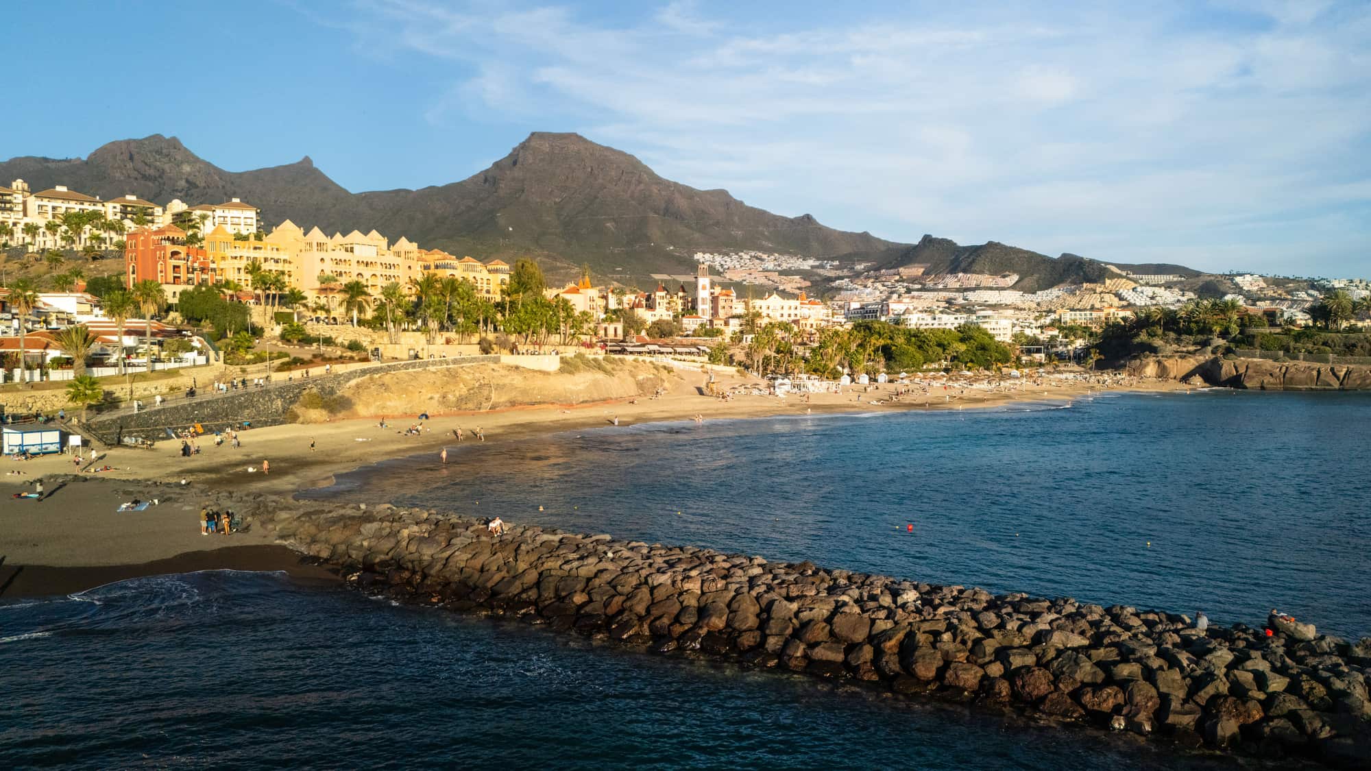 Playa del Duque in Costa Adeje with Roque del Conde behind it