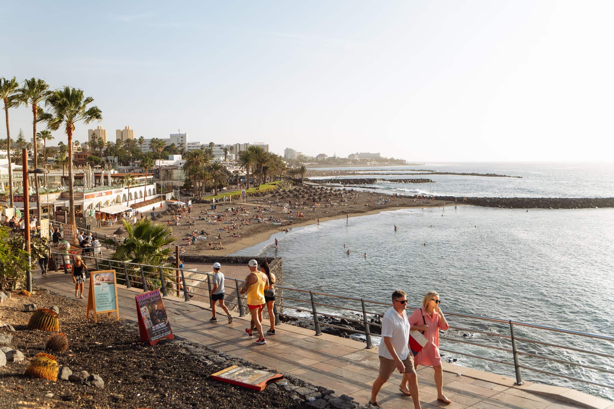 The seafront promenade and beach at Playa de las Americas